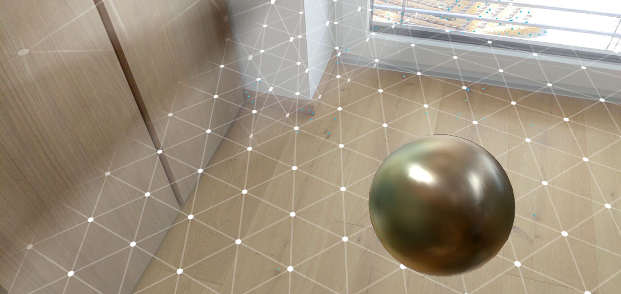 Screenshot of the reflective sphere placed in the real world, based on the Environmental HDR lighting by Google ARCore.